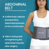 Person wearing an adjustable abdominal belt providing support and compression to the stomach area.