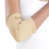Close-up of the Braceon elbow brace worn on a person's arm, showing adjustable straps and snug fit around the elbow.